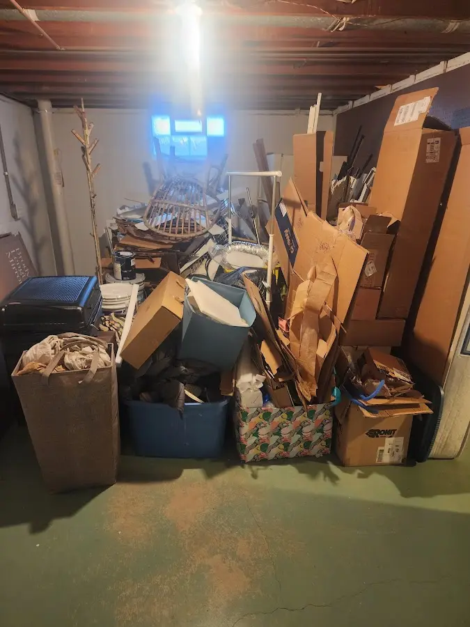 Roll-off dumpster container at job site for Yard Waste Dumpster Rental in Holly Springs